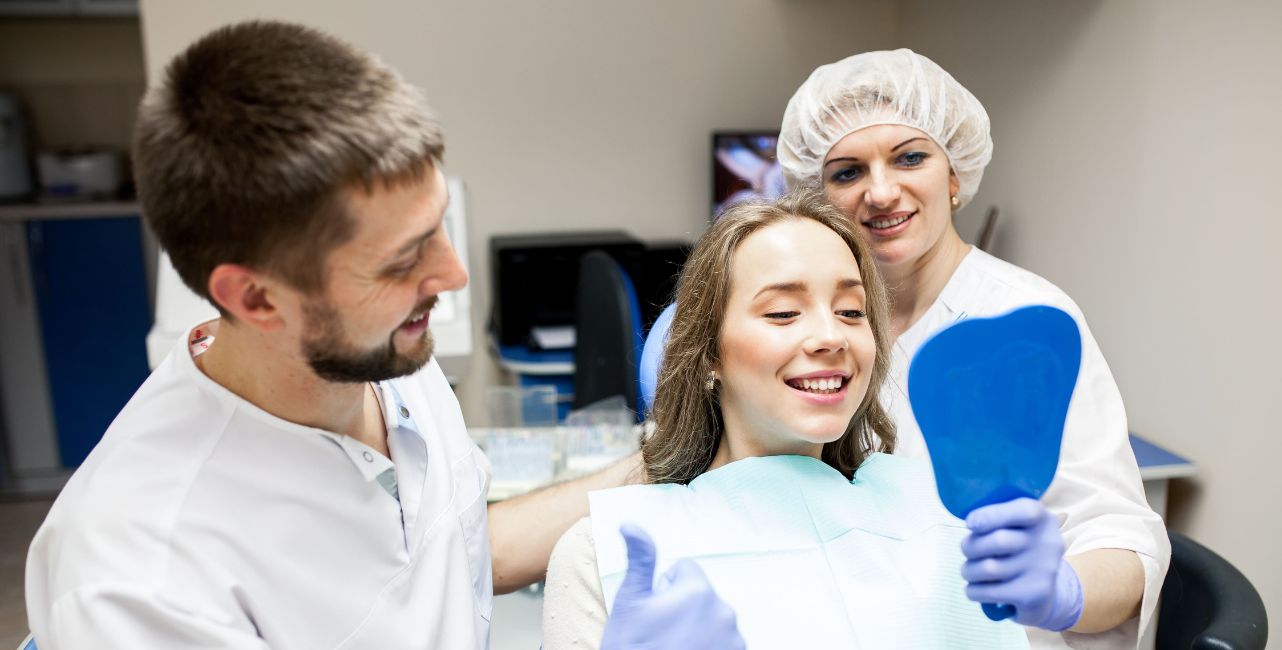 Patient smiling after Hollywood Smile E-max veneers treatment in Albania